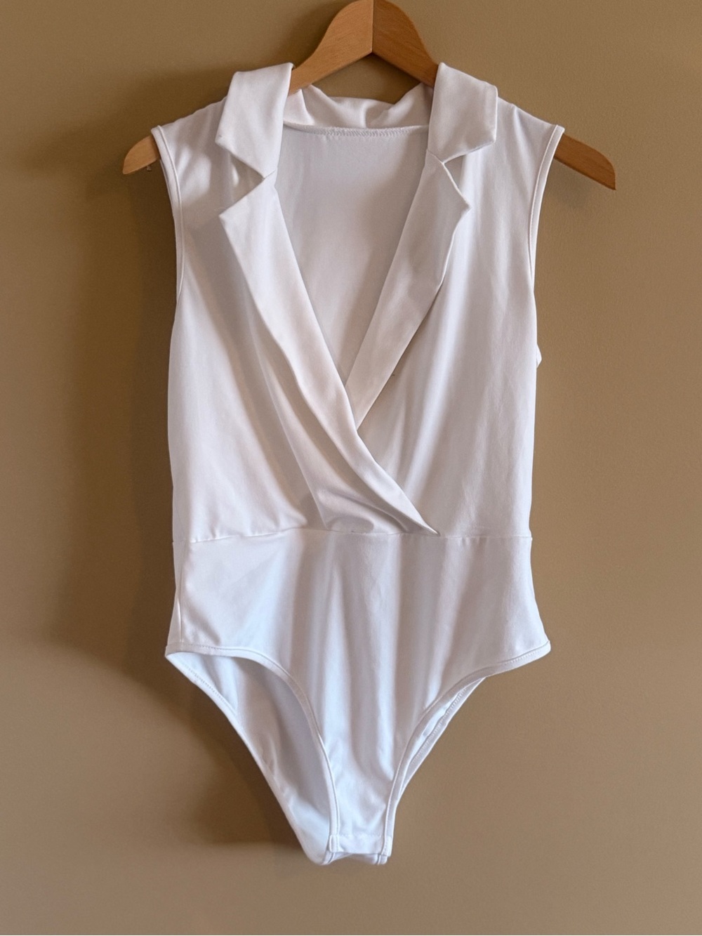 Sleeveless White Wrap-Front Women’s Bodysuit